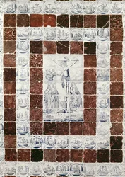 Azulejos de Delft que representan la Crucifixión con un borde de azulejos con escenas del Antiguo y Nuevo Testamento